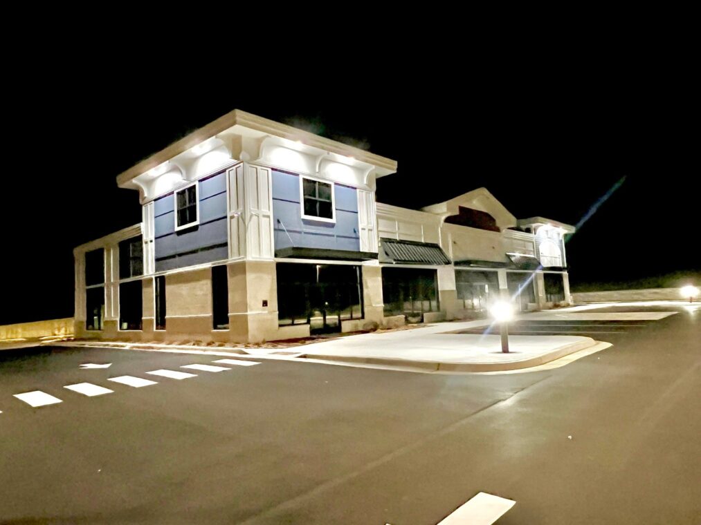 Hamptons Plaza of Oshtemo retail plaza lit at night, 6289 West Main Street, Oshtemo Township, Kalamazoo, Michigan