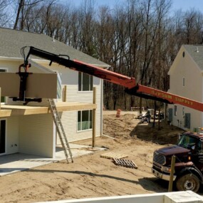 Balconies being installed on a new Keystone Lake Apartments home in Battle Creek, MI, by Carroll Development & Management